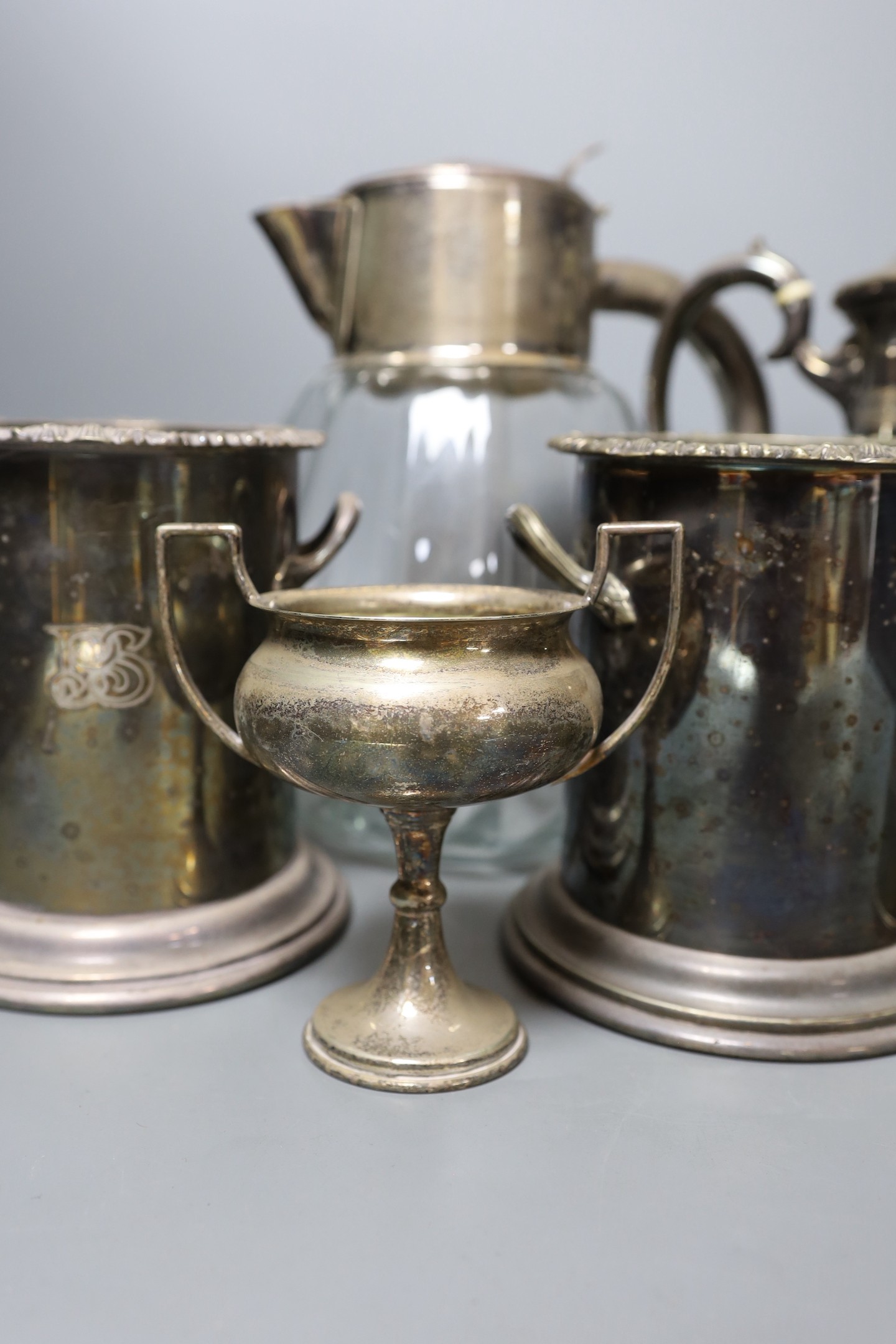 An early 20th century plate mounted lemonade jug and sundry plated ware